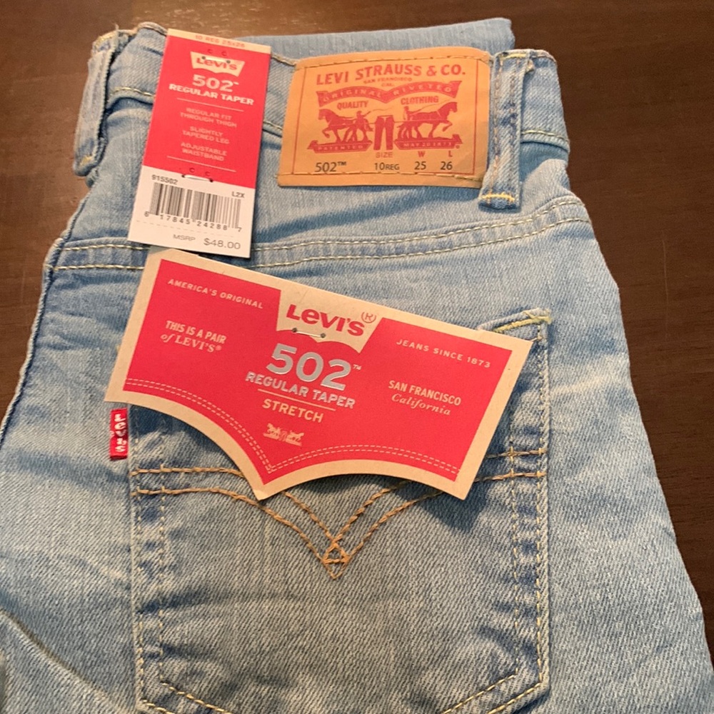 Levi’s 502 stone wash boys jeans. Size 10regular, waist 25, length 26.